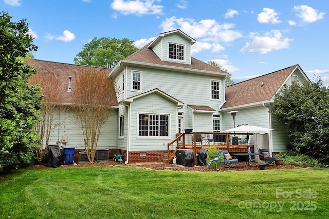 1214 Foxfield Rd, Waxhaw, NC 28173 - rear view of house featuring a deck, a lawn, and a shingled roof