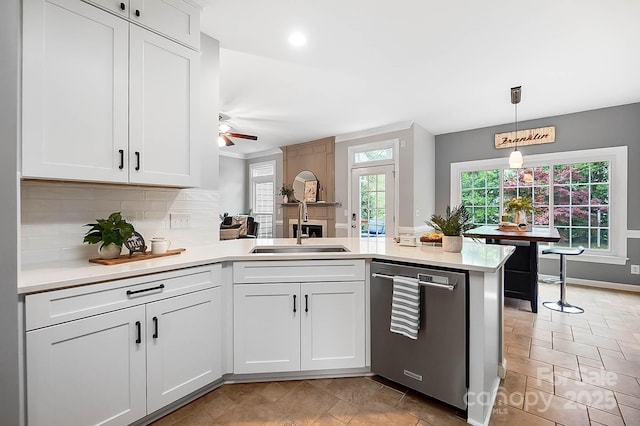 1214 Foxfield Rd, Waxhaw, NC 28173 - kitchen featuring dishwasher, a sink, light countertops, and recessed lighting