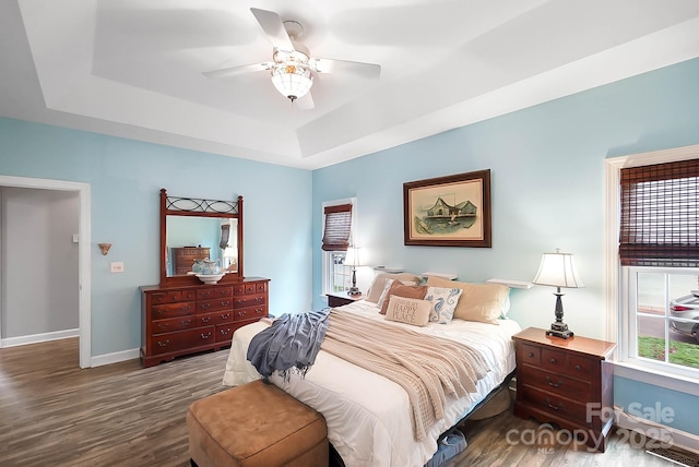 1214 Foxfield Rd, Waxhaw, NC 28173 - bedroom with wood finished floors, a raised ceiling, baseboards, and ceiling fan