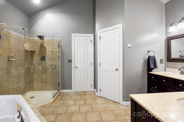 1214 Foxfield Rd, Waxhaw, NC 28173 - full bathroom featuring vanity, a shower stall, baseboards, and a tub