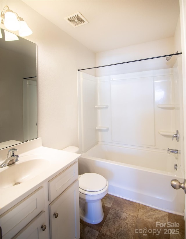 full bath featuring toilet, vanity, bathing tub / shower combination, and visible vents