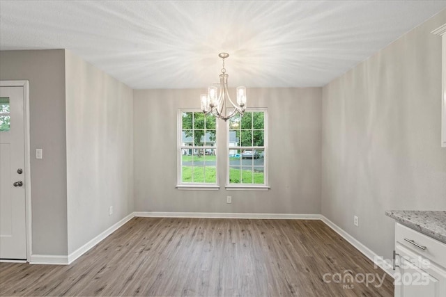 1320 Beaconfield Ct, Rock Hill, SC 29730 - unfurnished dining area featuring wood finished floors and a chandelier
