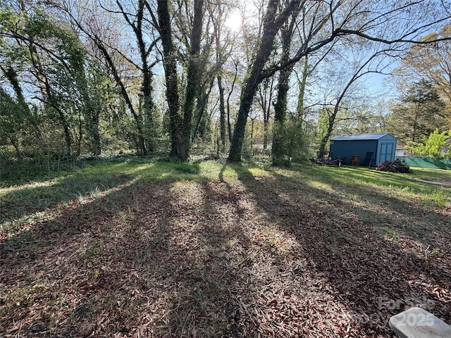 3316 Queens Ln Unit 10, Gastonia, NC 28052 - view of yard featuring an outbuilding and a shed