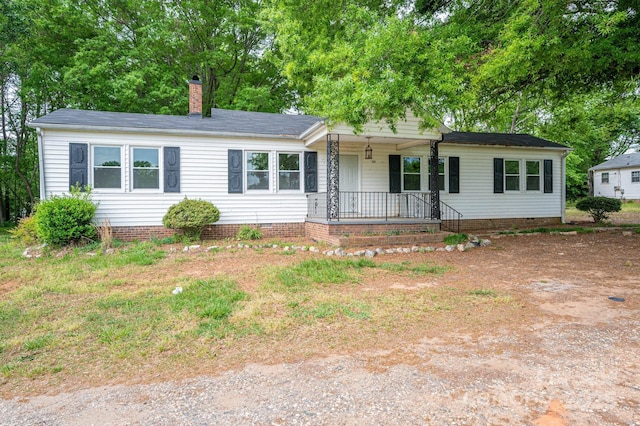 201 Lee Black Rd, Cherryville, NC 28021 - view of front facade featuring a chimney, crawl space, a porch, and a shingled roof