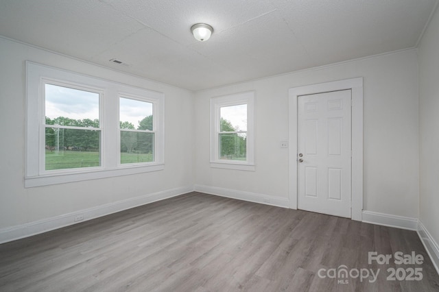 201 Lee Black Rd, Cherryville, NC 28021 - empty room featuring baseboards, wood finished floors, and visible vents