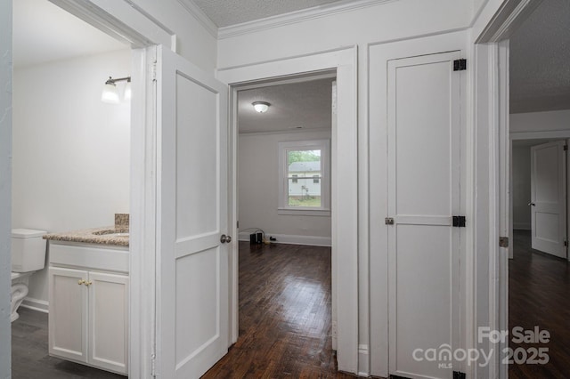 201 Lee Black Rd, Cherryville, NC 28021 - hallway featuring crown molding, baseboards, dark wood-style flooring, and a textured ceiling
