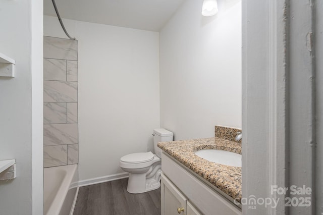 201 Lee Black Rd, Cherryville, NC 28021 - full bath featuring wood finished floors, vanity,  shower combination, baseboards, and toilet