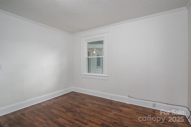 201 Lee Black Rd, Cherryville, NC 28021 - spare room with a textured ceiling, dark wood-style flooring, baseboards, and ornamental molding
