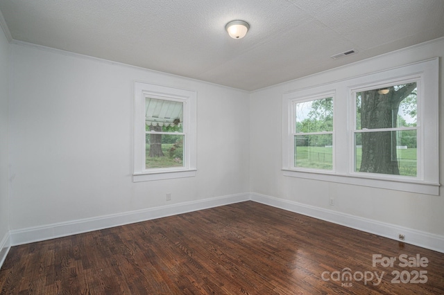 201 Lee Black Rd, Cherryville, NC 28021 - spare room with dark wood finished floors, baseboards, crown molding, and visible vents
