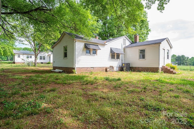 201 Lee Black Rd, Cherryville, NC 28021 - rear view of property featuring a chimney and central AC unit