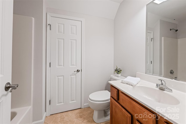 full bath featuring baseboards, toilet, vanity, and tile patterned floors