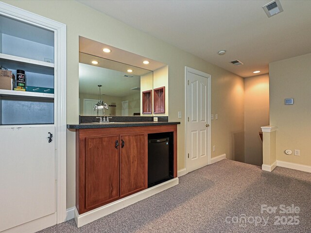 bathroom featuring recessed lighting, baseboards, and vanity
