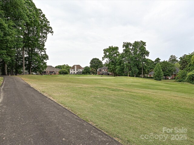 view of community with a yard