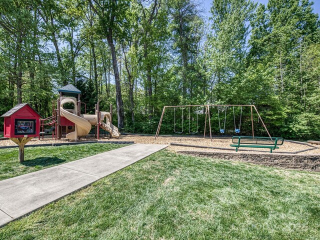 communal playground with a lawn