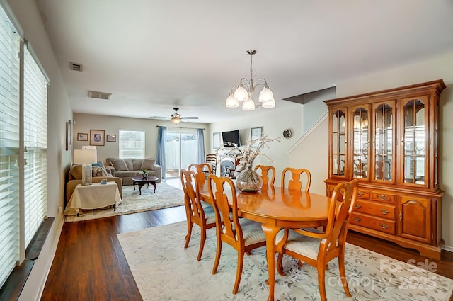 309 River Clay Rd, Fort Mill, SC 29708 - dining area with visible vents, ceiling fan with notable chandelier, and dark wood finished floors
