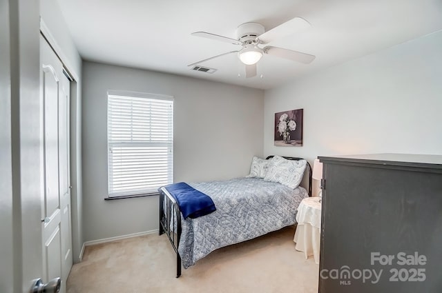 309 River Clay Rd, Fort Mill, SC 29708 - bedroom with light colored carpet, visible vents, a closet, and ceiling fan