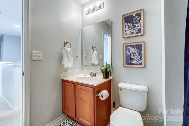309 River Clay Rd, Fort Mill, SC 29708 - half bathroom featuring toilet and vanity
