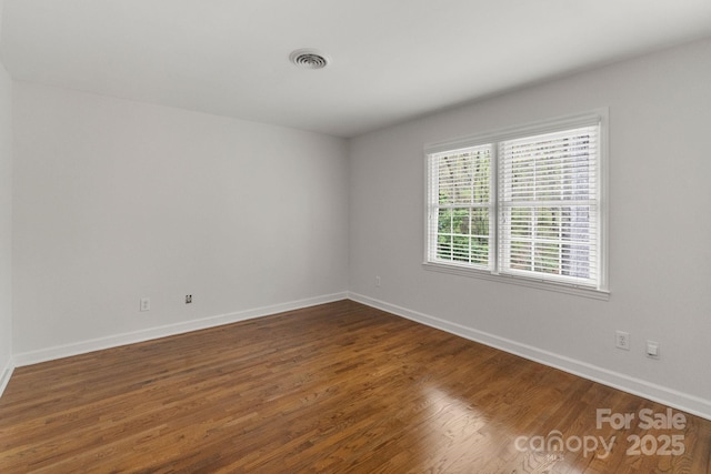 5125 Winding Brook Rd, Charlotte, NC 28226 - unfurnished room with wood finished floors, baseboards, and visible vents