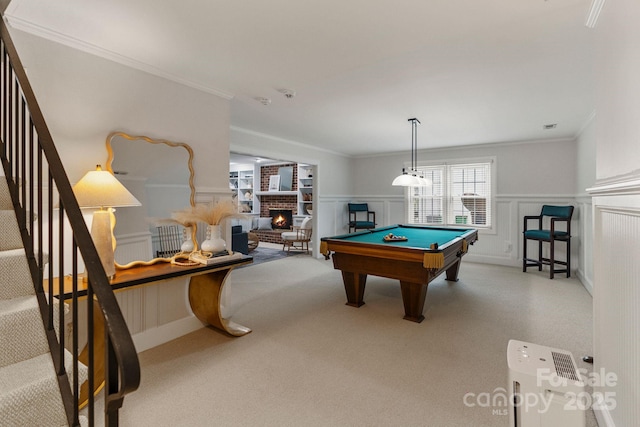 5125 Winding Brook Rd, Charlotte, NC 28226 - game room with a decorative wall, a fireplace, ornamental molding, billiards, and wainscoting