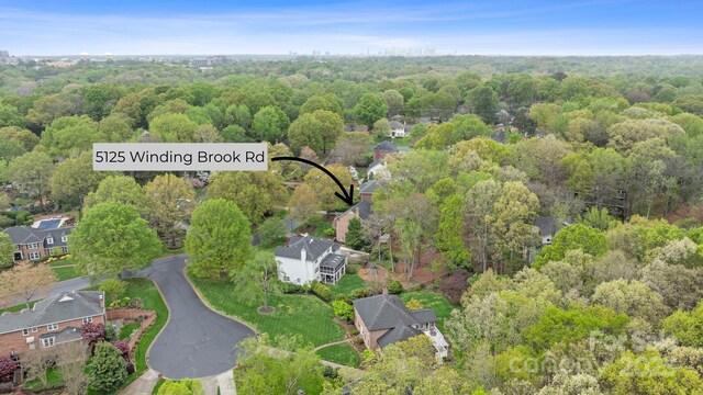5125 Winding Brook Rd, Charlotte, NC 28226 - bird's eye view with a wooded view