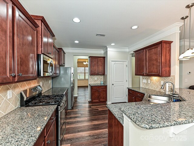 4425 Marlay Park, Indian Trail, NC 28079 - kitchen featuring appliances with stainless steel finishes, a sink, dark wood-style flooring, decorative backsplash, and dark stone counters