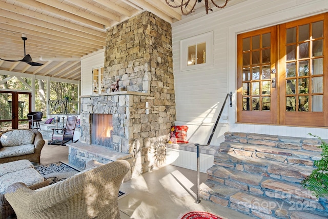 144 Miller Dr, Tryon, NC 28782 - view of patio / terrace with an outdoor living space with a fireplace and a ceiling fan
