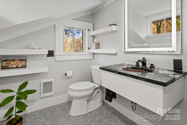 144 Miller Dr, Tryon, NC 28782 - half bathroom with toilet, vanity, baseboards, and heating unit