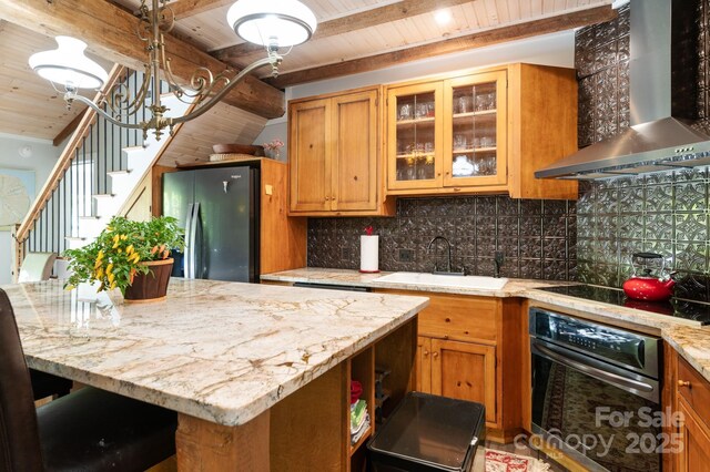 144 Miller Dr, Tryon, NC 28782 - kitchen featuring freestanding refrigerator, wall chimney exhaust hood, a sink, black electric stovetop, and oven