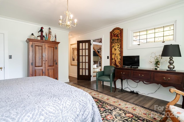 144 Miller Dr, Tryon, NC 28782 - bedroom with a chandelier, dark wood finished floors, and ornamental molding