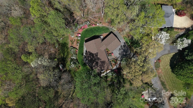 aerial view with a wooded view