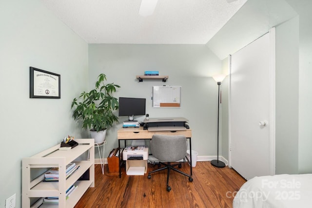 office featuring baseboards and wood finished floors