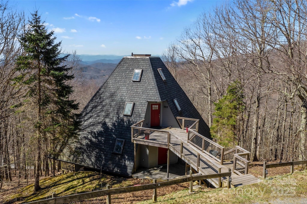 585 Granny Lewis Ln, Mars Hill, NC 28754 - back of property with roof with shingles, stairway, and a deck
