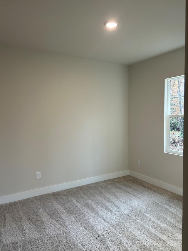 1218 Fall Day Cir SW, Lenoir, NC 28645 - spare room featuring recessed lighting, baseboards, and carpet