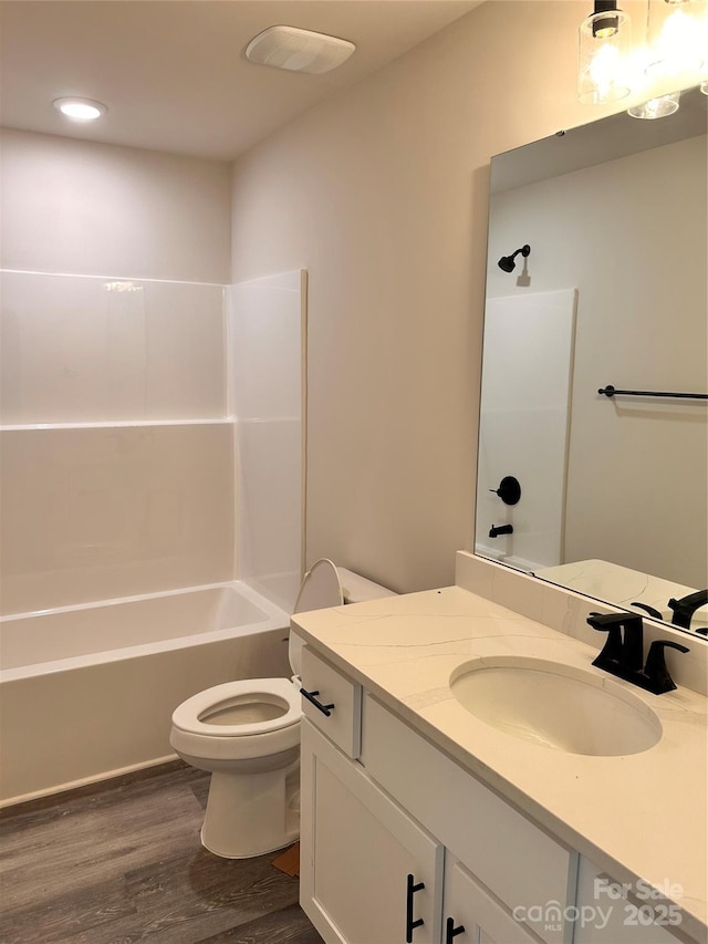 1218 Fall Day Cir SW, Lenoir, NC 28645 - bathroom featuring vanity, wood finished floors, bathtub / shower combination, and recessed lighting