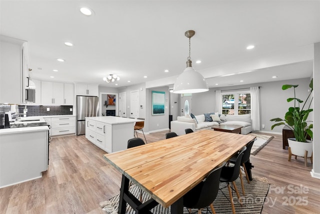 4522 Woods End Ln, Charlotte, NC 28277 - dining area featuring recessed lighting, baseboards, and light wood-type flooring