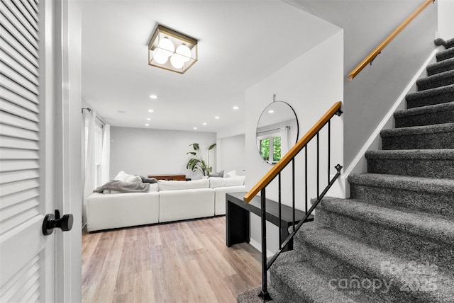 4522 Woods End Ln, Charlotte, NC 28277 - stairway featuring wood finished floors and recessed lighting