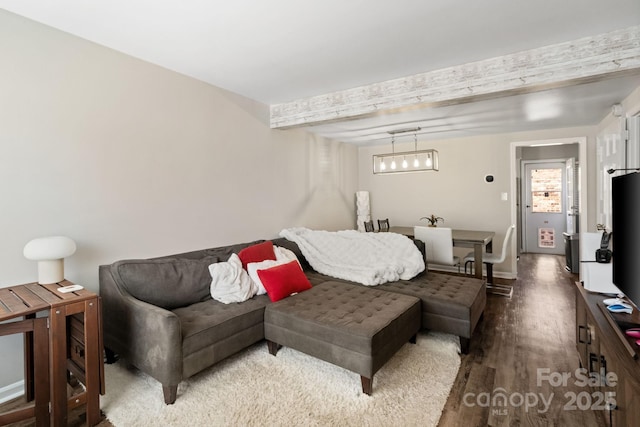 6354 Old Pineville Rd Unit F, Charlotte, NC 28217 - living room featuring baseboards, beam ceiling, and wood finished floors