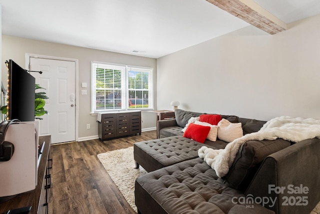 6354 Old Pineville Rd Unit F, Charlotte, NC 28217 - living area with dark wood-type flooring, baseboards, beam ceiling, and visible vents