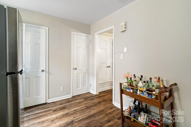 6354 Old Pineville Rd Unit F, Charlotte, NC 28217 - corridor with baseboards and dark wood-style floors
