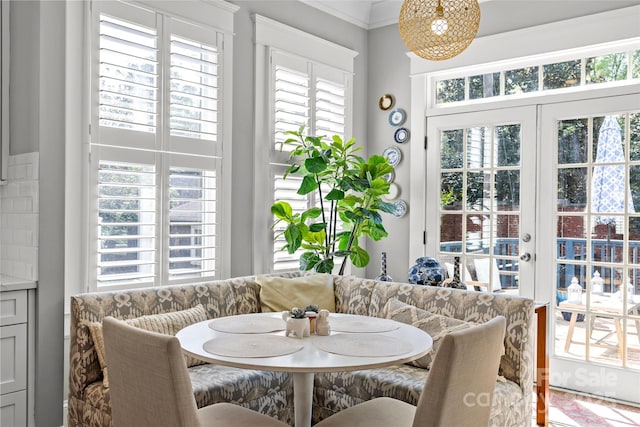 806 Sunnyside Ave, Charlotte, NC 28204 - dining area with plenty of natural light, french doors, and crown molding