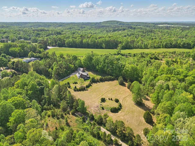 drone / aerial view with a forest view