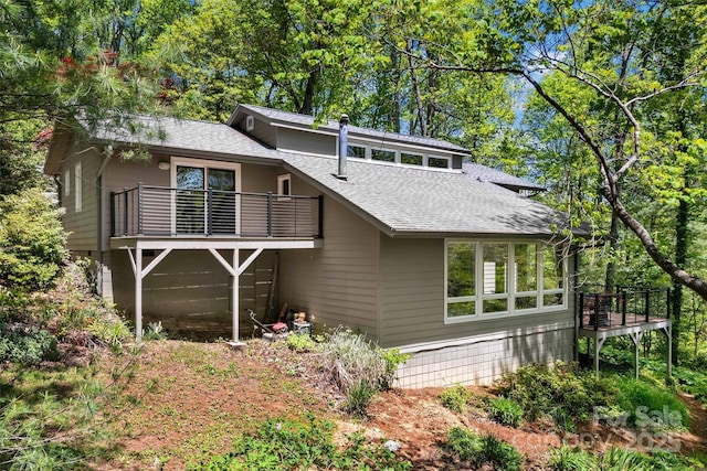 27 Stokes Dr, Asheville, NC 28805 - view of front of house with a shingled roof, a balcony, and a deck