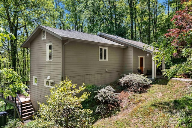 27 Stokes Dr, Asheville, NC 28805 - view of side of home featuring a deck, a shingled roof, and stairs