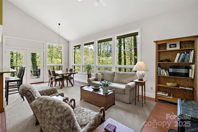 27 Stokes Dr, Asheville, NC 28805 - living area featuring baseboards, french doors, ceiling fan, tile patterned flooring, and high vaulted ceiling