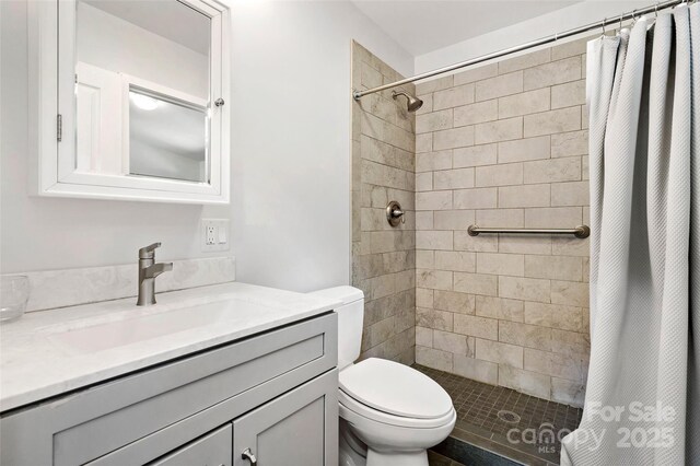 27 Stokes Dr, Asheville, NC 28805 - full bathroom featuring toilet, a stall shower, and vanity
