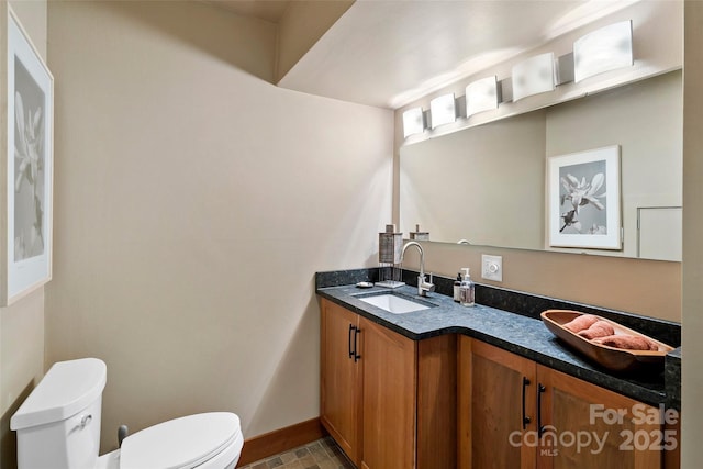 27 Stokes Dr, Asheville, NC 28805 - half bath featuring toilet, baseboards, and vanity