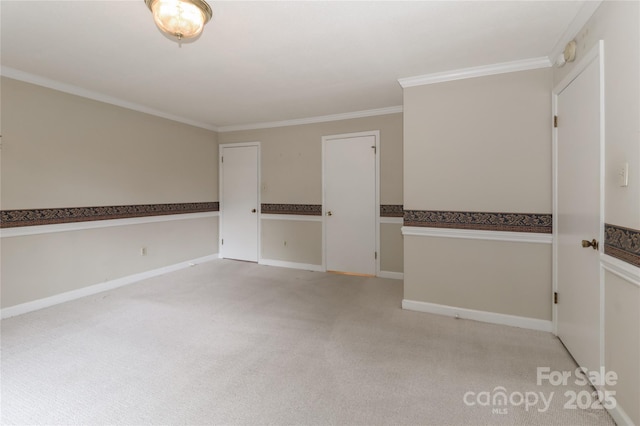783 Carpenter Ave, Mooresville, NC 28115 - empty room featuring light colored carpet, crown molding, and baseboards