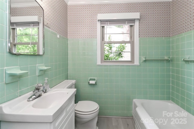 783 Carpenter Ave, Mooresville, NC 28115 - full bathroom with plenty of natural light, tile walls, toilet, a bath, and wood finished floors