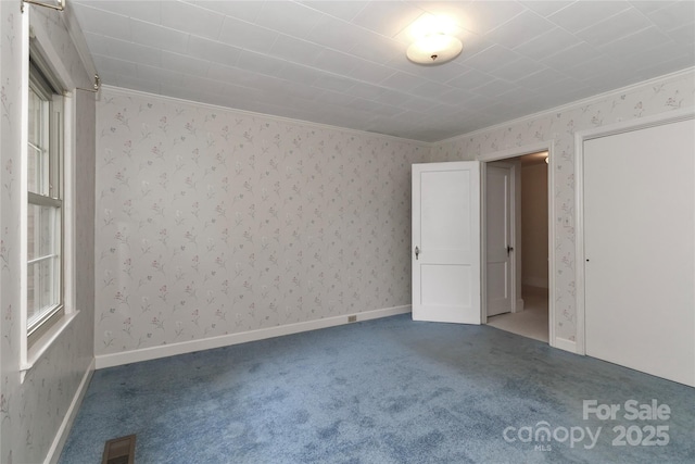 783 Carpenter Ave, Mooresville, NC 28115 - carpeted spare room featuring ornamental molding and wallpapered walls
