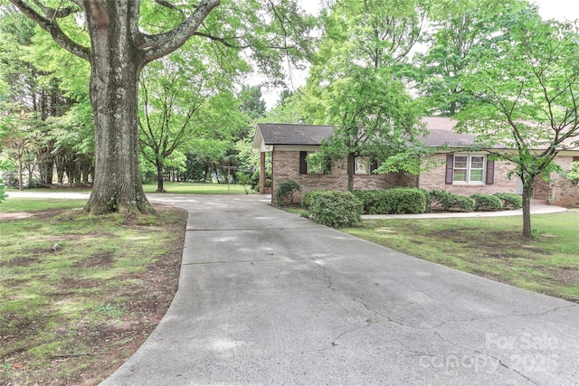 783 Carpenter Ave, Mooresville, NC 28115 - single story home featuring brick siding, driveway, and a shingled roof